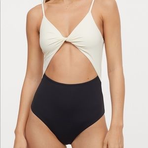 H&M cream and black swimsuit